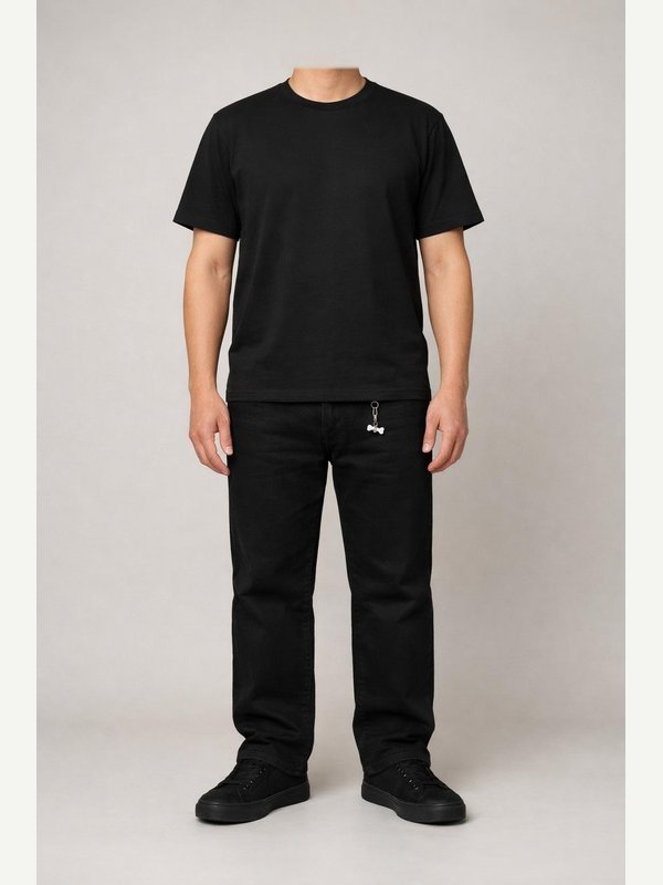 Skeleton A — AI-generated adult in black tee, black jeans, black sneakers and a tiny bone keyring.