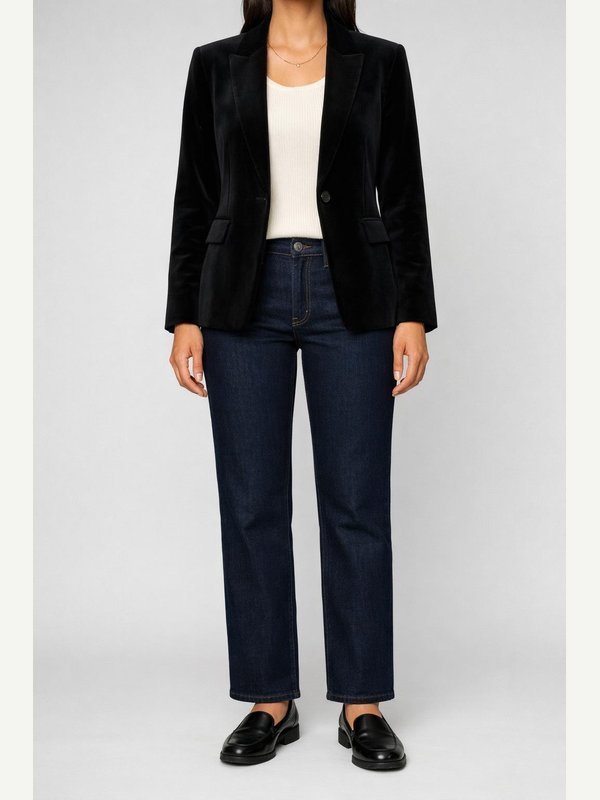 Black velvet blazer over a cream knit top, neat dark indigo straight jeans, black leather loafers and a simple gold necklace.