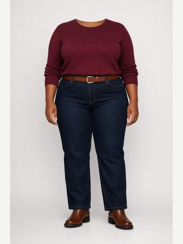 Burgundy fine-knit sweater, tailored dark indigo jeans, brown leather ankle boots and a slim brown belt.